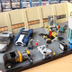 Image for article titled This Cool Fan-Made LEGO Iron Man Garage Has Some Great Models Of The Audi R8 And AC Cobra, Too